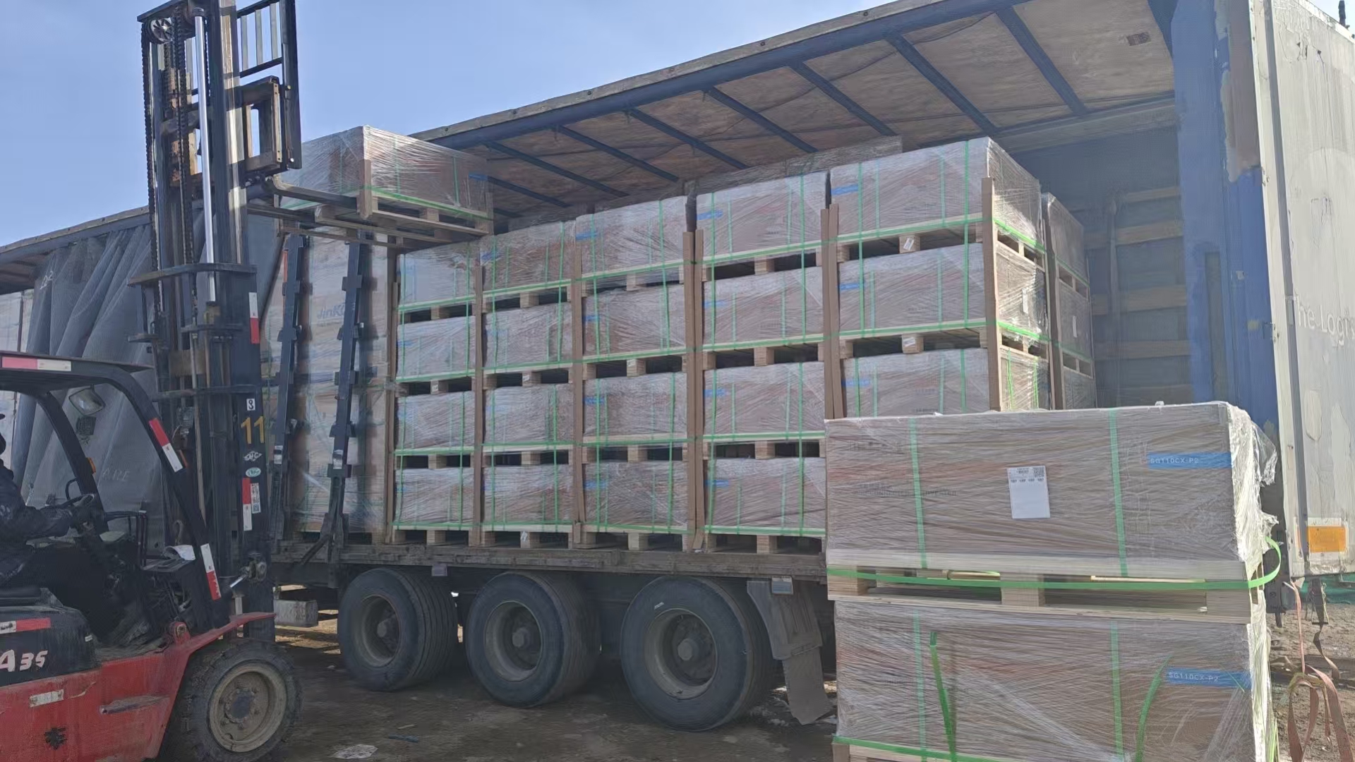 Solar panels and inverters in export packaging
